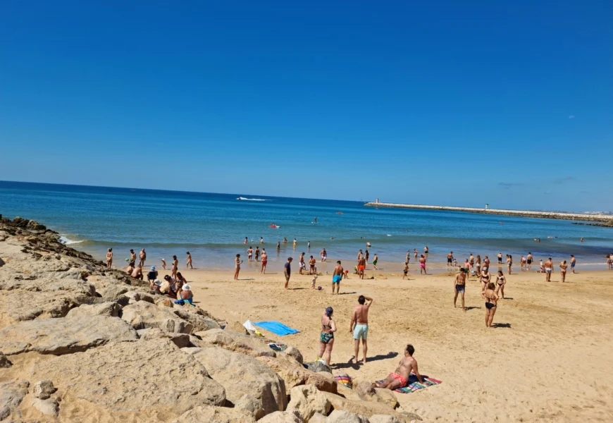 a crowded beach with people