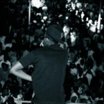 a man standing in front of a crowd of people