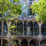 gray building beside trees