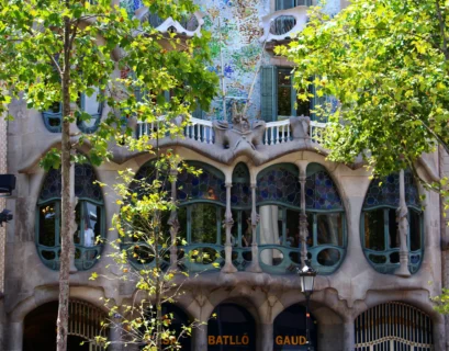 gray building beside trees