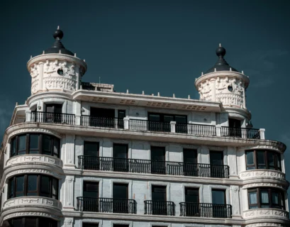 white concrete building under blue sky during daytime